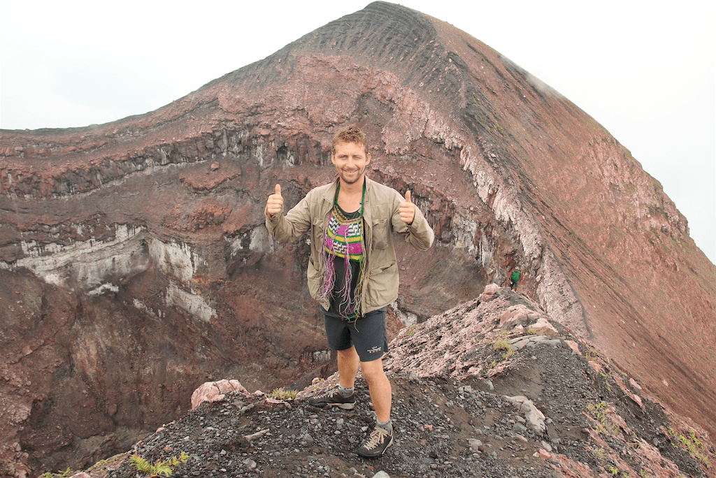 Thor at crater of the active volcano on Bam island. 